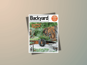 Backyard Creative Australian Living Magazine cover, Issue 13.5 (2015), featuring two Paal Grant landscape projects including a formal coastal garden softened by layered planting.