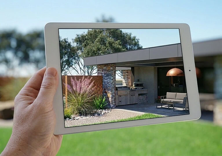 Tablet showing augmented reality view of contemporary native garden design at Mount Sturgeon, Grampians